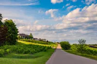 Open Concept with Modern Kitchen and Parking - Charming Studio Hotels in Traverse City