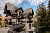 Villa Tom Hotel a 