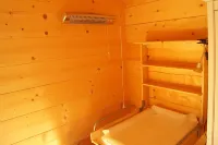 Fantastic apartment in a log cabin in front of the mountains