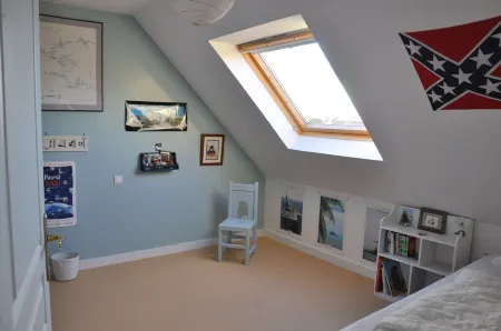 Large, bright house with south-facing garden near the beach.