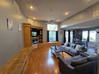 Lake Front home Sleeps 10 Overlooking deck for perfect lake views & a coffee bar