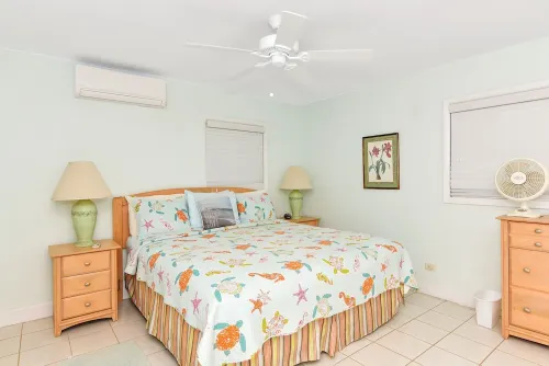 Ixora West - Views over Elizabeth harbor, beach access across the road.