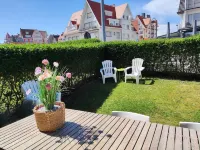 Modern duplex apartment, ground floor with garden within walking distance of the sea