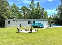 Cozy Beach Home w/ Fire Pit, Grill & Outdoor Swings— Min from Surf City Pier!