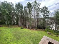 Non-smoking lake house with private beach, dock and kayaks