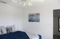 Tranquil Canal Front Villa in Golfers Paradise: Peaceful 3-BDR