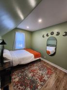 This is a private second-floor suite with its own entrance.
