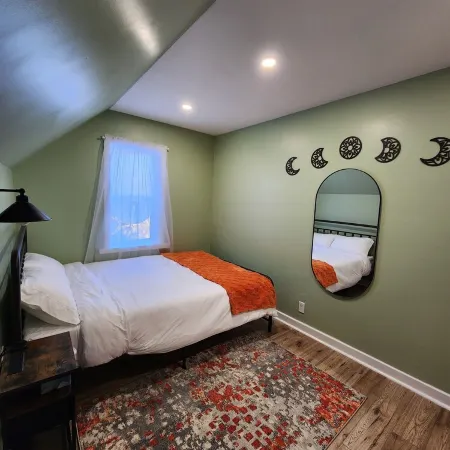 This is a private second-floor suite with its own entrance.