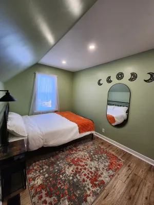 This is a private second-floor suite with its own entrance.