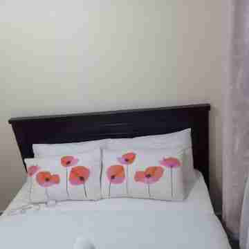 Apartment near JKIA and Wilson Airport with nearby Malls and entertainment joint Rooms