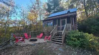 Cozy Pet Friendly Mountain Log Cabin in the Smokies with Deck and fire pit.