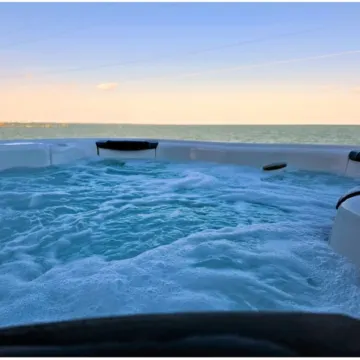 Waterfront! Hot Tub, Arcade, Pool, Walk to Everything in Fulton, Sleeps 8