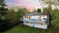 Incredible Water Views, Deck Relaxing Retreat Greenbank Getaway by Avantstay