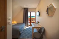 PRZY TERMACH - Pokoje Apartamenty Domki