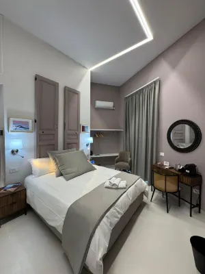 Poerio Station Rooms & Apartment - مطابخ