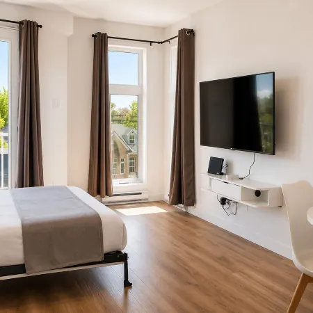 Appart'hôtel Viveo - Par Aneyro Отели рядом с достопримечательностью «Спортивный комплекс «Видеотрон-Центр»»