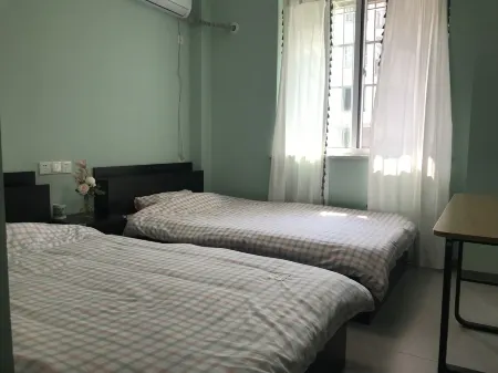 Yimiyangguang YY Apartment (Huota Line) Отели рядом с достопримечательностью «Mulan Grassland»