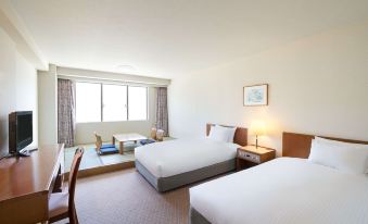 a hotel room with two beds , a desk , and a window , all decorated in white and brown colors at Grand Mercure Lake Hamana Resort & Spa