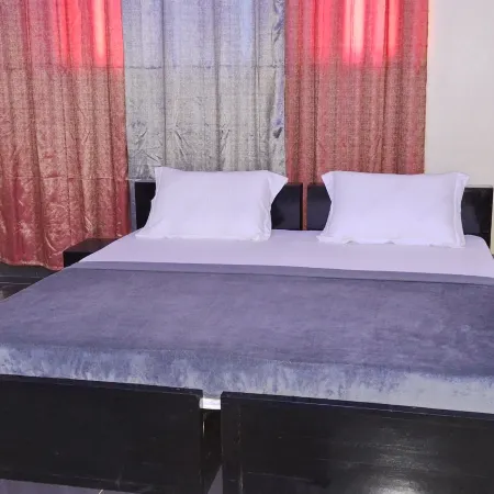 Deluxe Twin Beds Bedroom in Lome Togo