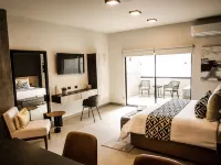Esplendor by Wyndham San Luis Potosi Отели рядом с достопримечательностью «Арена «Эль-Домо»»