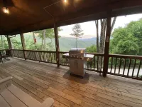 Private Cabin with  Mountain Views, Fire Pit, Wraparound Deck, and Game Room!