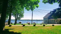 Lake George cottage with large lakefront lawn