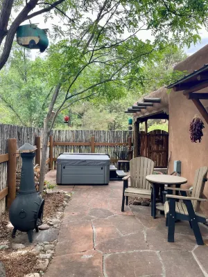 Cozy Casa Carmelita features a Brilliant Kiva Fireplace, Unique Patio & Hot Tub!