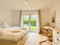 "Alle_zusammen" - Modern and bright vacation apartment with large garden