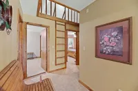 Large private lot.  Beautiful cabin with a stream and trout pond!