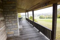 Historic Log Cabin on 200 acre farm, pasture and forest with panoramic views!