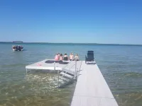 Spectacular Lake Front Home on Beautiful Higgins Lake with Amazing Sunset Views