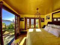 SHABBY CHIC WATERFRONT RETREAT is a relaxing, serene low bank waterfront home