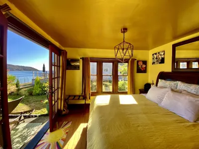 SHABBY CHIC WATERFRONT RETREAT is a relaxing, serene low bank waterfront home