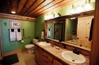 5 bedroom custom Lodge, log home. rec room, on river, fishing, open kitchen