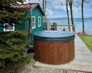Cozy Cabin with 165 Ft Beach and Wood-Fired Hot Tub! Center of Flx Wine Country!