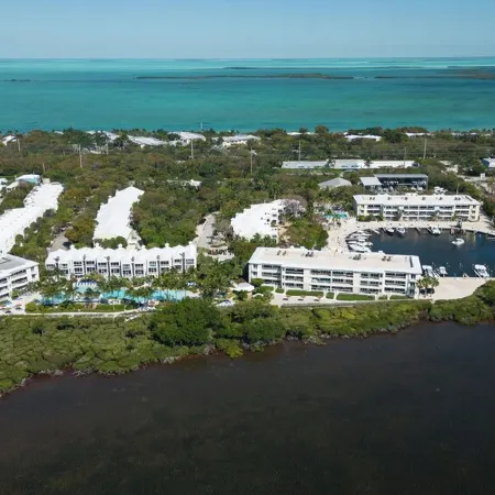 Resort-Style Living at Mariner's Club – Steps from Pools, Marina, & Ocean Views!