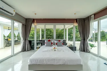 รูปภาพของพลูวิลล่าหรูและสดใส 5 ห้องนอน - ซีซี