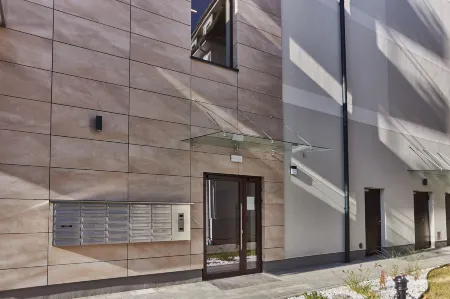 Apartamenty Świnoujście - Kormoran Отели рядом с достопримечательностью «Свиноуйсьценский маяк»