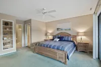Cozy Condo with Rock Fireplace and Pool - Gorgeous Waterfront Oasis