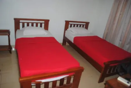 Sri Cemerlang Lodge Отели в г. Panji