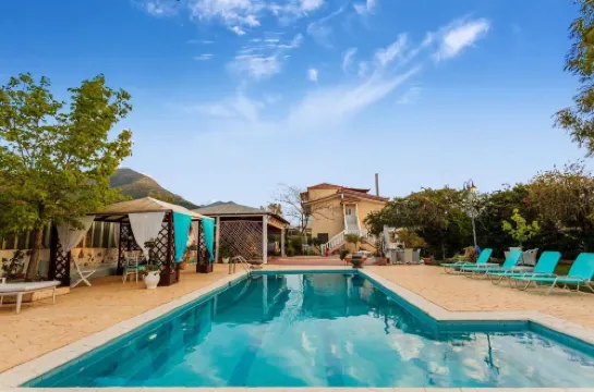 Villa Vlassoula - Beachfront Luxury Villa with Private Pool & Garden Heaven