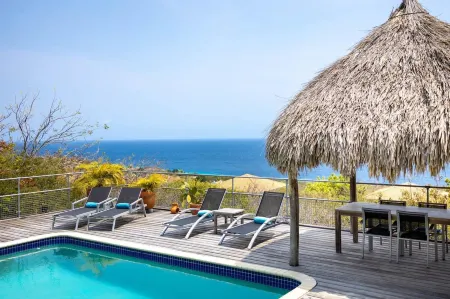 Coral Vista Ocean View Pool Paradise Отели рядом с достопримечательностью «Cas Abao Beach»