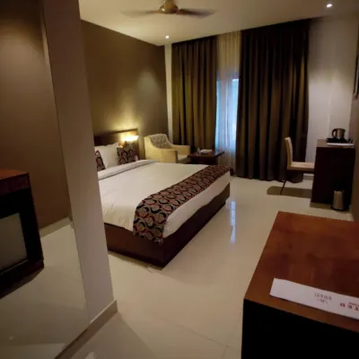 Ambal Regency Hotels near Sree Kannampuzha Bhagavathy Temple