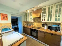 A Quaint Grade 11 Listed Detached Stone Cottage In Lower Slaughter with parking.