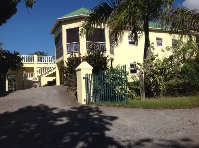 Villa with large pool, screened terrace overlooking Caribbean. Hotels in 