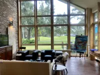 Amazing modern home on the 14th hole of the Pines golf course in Diamondhead MS!