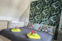 FH with Garden, Playground, Sauna, Fitness, 2 Bedrooms, Kitchen with Dishwasher Hotels in Ludorf