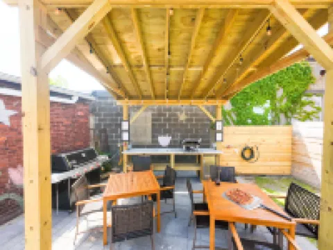 Spacious Outdoor Patio and Modern Kitchen - Inviting Urban Haven