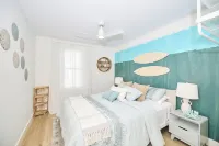 Scott McGillvary's Beachside Abode across from Stunning Bay Beach. New HOT TUB!