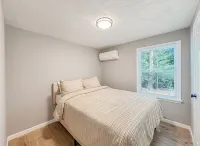 Cozy cottage with AC and lake access in charming Connecticut suburb.